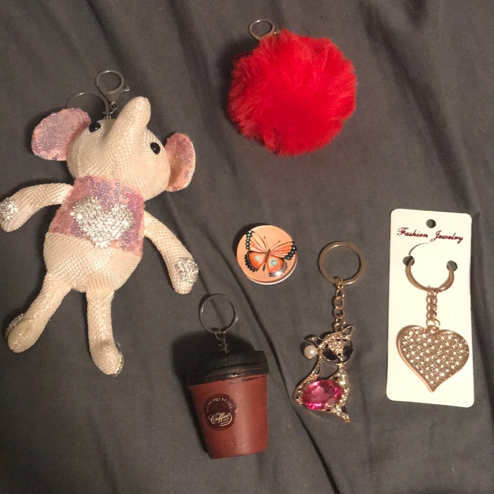 Assortment of keychains and a pop socket